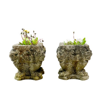 Lot 223 - A pair of concrete planters.