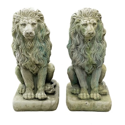 Lot 190 - A pair of reconstituted stone lion figures.