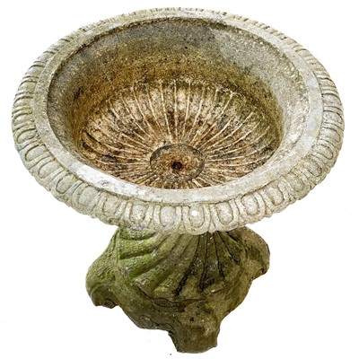 Lot 28 - A reconstituted stone planter.