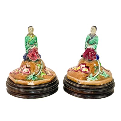 Lot 248 - A pair of Majolica vase covers on stands.