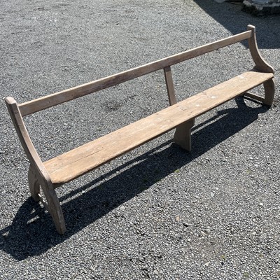 Lot 184 - A 19th century pine pew bench