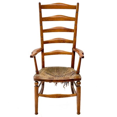 Lot 121 - A Victorian beech framed ladderback kitchen armchair.