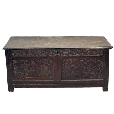 Lot 214 - A 17th century oak carved coffer.