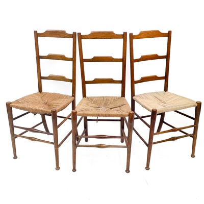 Lot 245 - Three Victorian ladderback chairs.