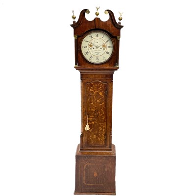 Lot 24 - An oak eight-day longcase clock.