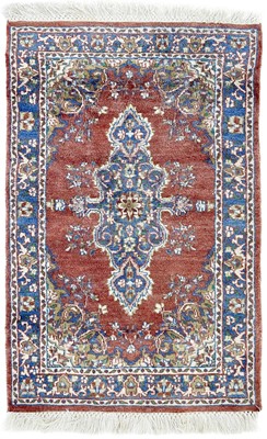 Lot 10 - An Indian rug, mid 20th century.