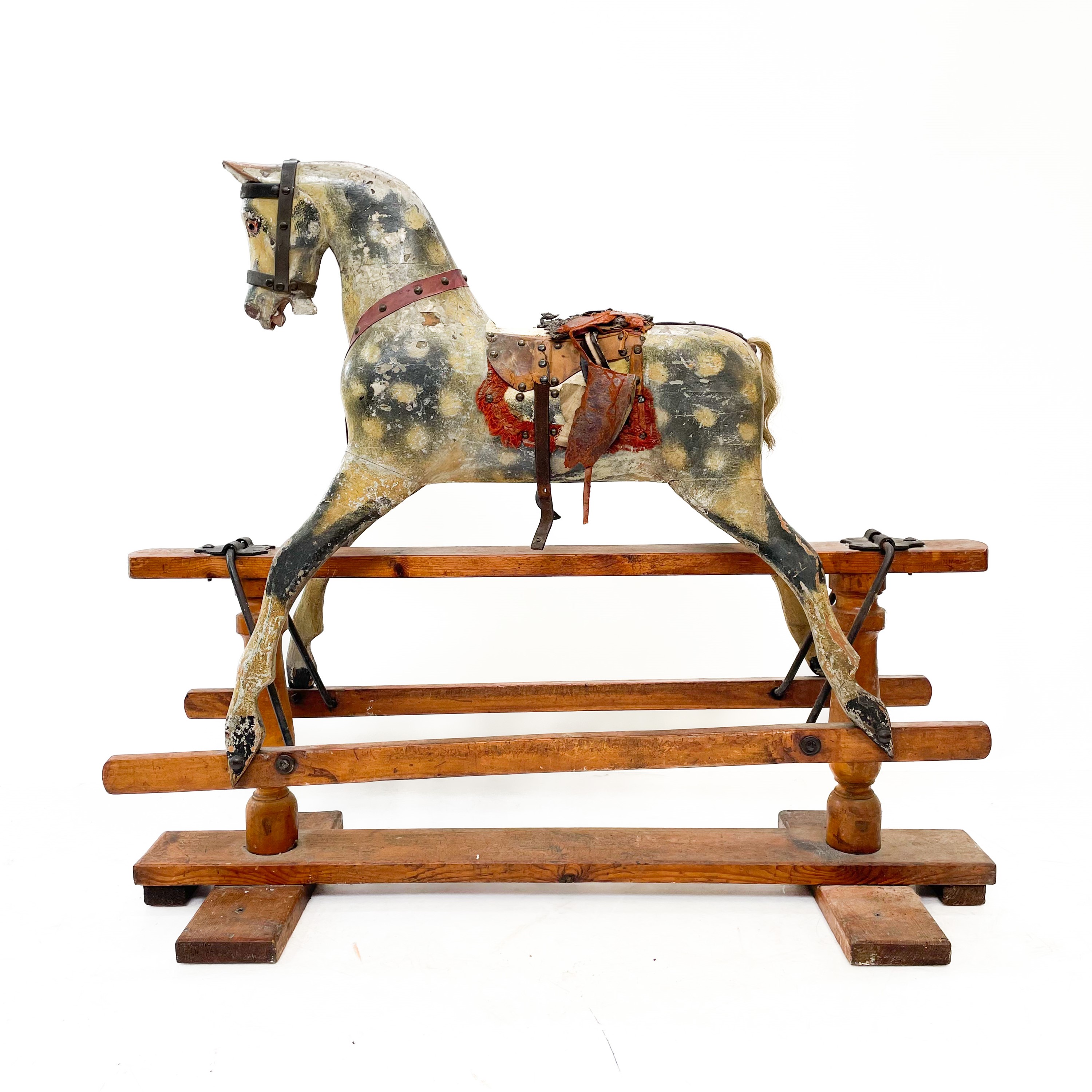 Lot 2 - A Victorian dapple grey rocking horse.