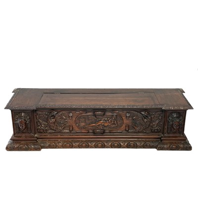 Lot 231 - A late 19th century walnut carved cassone.