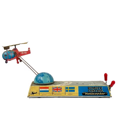 Lot 240 - A tin toy clockwork Remote Control Helicopter by Billers circa 1960.