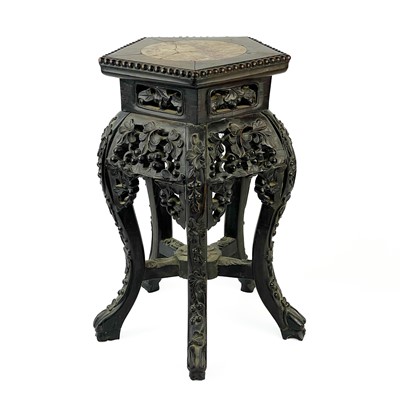 Lot 164 - A Chinese carved hardwood jardiniere stand, 19th century.