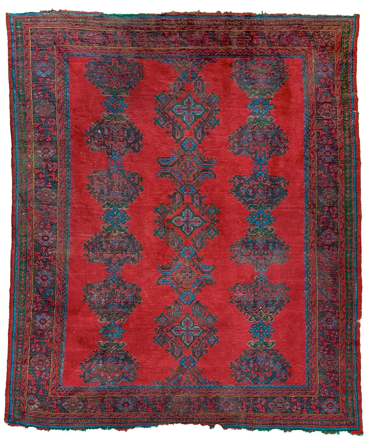 Lot 14 - An Ushak 'Turkey Red' carpet, West Anatolia, circa 1900.