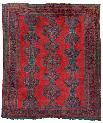 Lot 14 - An Ushak 'Turkey Red' carpet, West Anatolia, circa 1900.