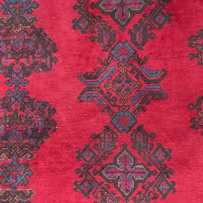 Lot 14 - An Ushak 'Turkey Red' carpet, West Anatolia, circa 1900.