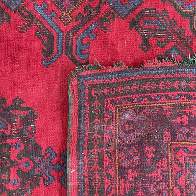 Lot 14 - An Ushak 'Turkey Red' carpet, West Anatolia, circa 1900.