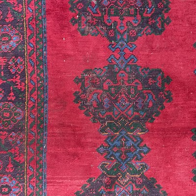 Lot 14 - An Ushak 'Turkey Red' carpet, West Anatolia, circa 1900.