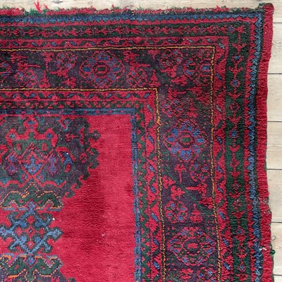 Lot 14 - An Ushak 'Turkey Red' carpet, West Anatolia, circa 1900.