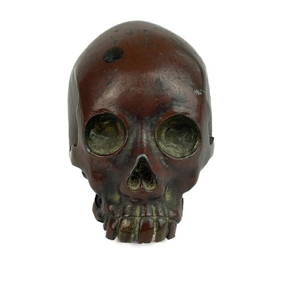 Lot 287 - A Japanese bronze model of a skull.