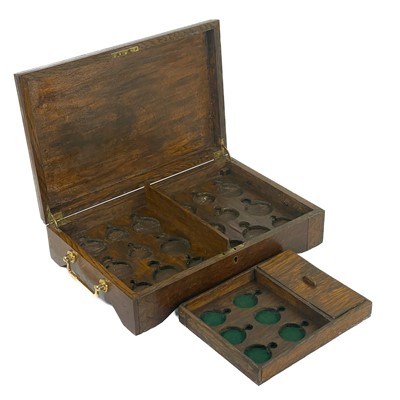 Lot 105 - An oak hinge-lidded pocket watch storage box.