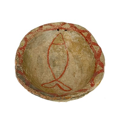 Lot 415 - A primitive pottery bowl.