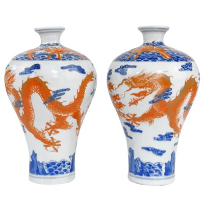 Lot 408 - A pair of Chinese blue and iron red porcelain vases, 19th century.