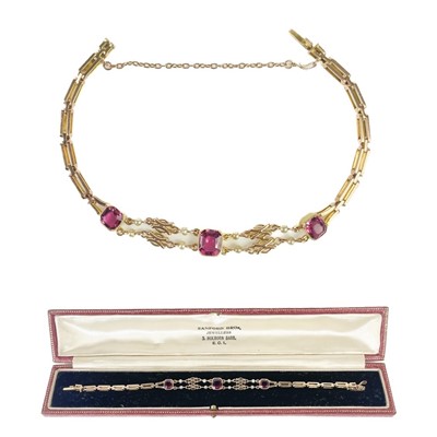 Lot 231 - An Edwardian 15ct gold tourmaline and seed pearl set bracelet.