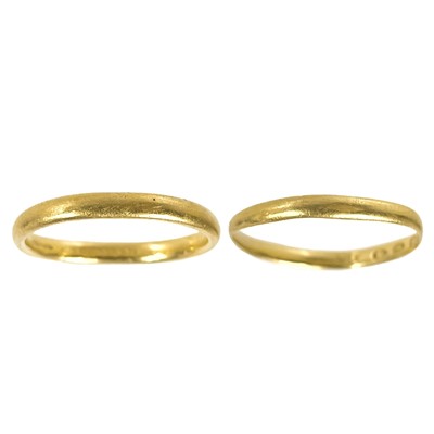 Lot 6 - Two Victorian 22ct gold band rings.