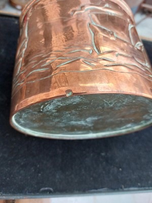 Lot 5 - A Newlyn copper oval tea caddy.