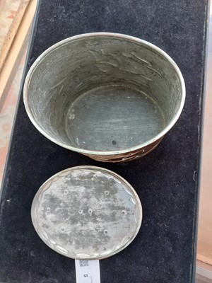 Lot 5 - A Newlyn copper oval tea caddy.