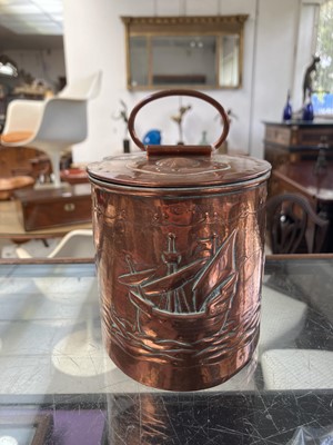 Lot 5 - A Newlyn copper oval tea caddy.