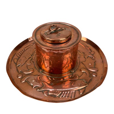 Lot 64 - A Newlyn copper circular ink well and cover.