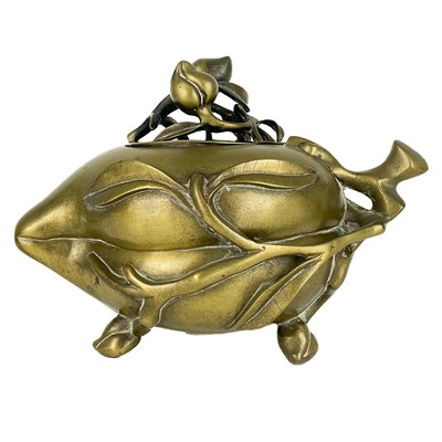 Lot 116 - A Chinese polished bronze peach form censer, 19th century.