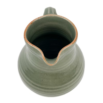 Lot 416 - A Crowan Pottery celadon jug by Harry Davis.