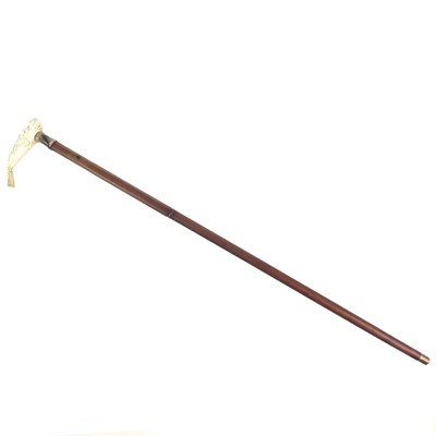 Lot 55 - A whalebone and cedar walking cane.