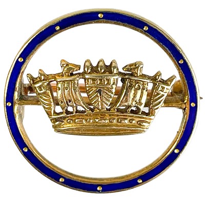 Lot 35 - A 14ct gold and blue enamel Royal Navy & Merchant Services sweetheart brooch.