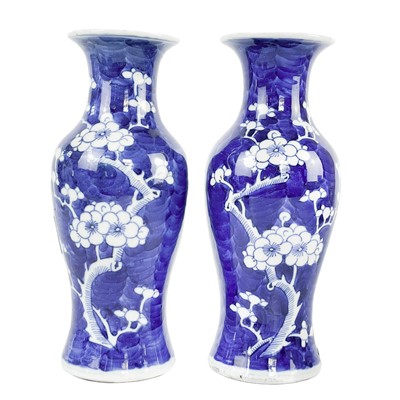 Lot 153 - Two Chinese porcelain prunus pattern vases, late 19th century.