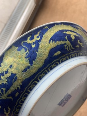 Lot 120 - A Chinese porcelain dragon dish, Qianlong mark and period.