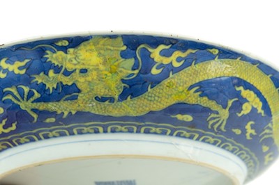 Lot 120 - A Chinese porcelain dragon dish, Qianlong mark and period.