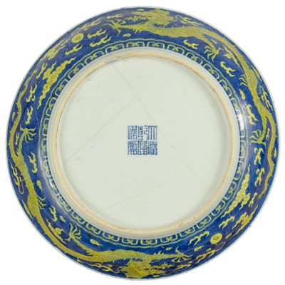 Lot 120 - A Chinese porcelain dragon dish, Qianlong mark and period.