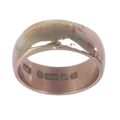 Lot 79 - An Edwardian 9ct heavy rose gold band ring.