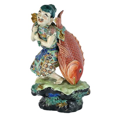 Lot 137 - A Japanese Arita porcelain figure, 19th century.