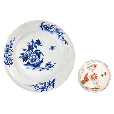 Lot 410 - A Lowestoft plate with blue and white floral and insect decoration.