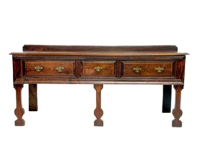 Lot 210 - A George III oak dresser base.