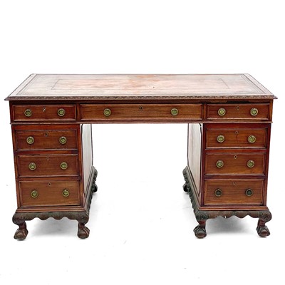 Lot 450 - A Georgian style mahogany twin pedestal free standing writing desk.