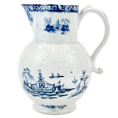 Lot 431 - A large Lowestoft blue and white floral moulded jug.