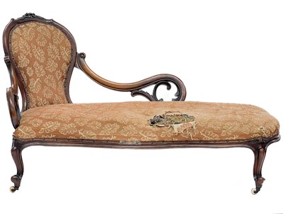 Lot 652 - A mid 19th century walnut chaise longue.