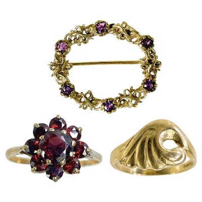 Lot 260 - A 9ct garnet set ring, a 9ct ring and a 9ct ruby set brooch.