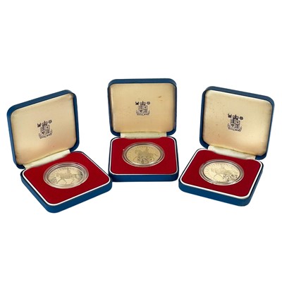 Lot 60 - Three boxed royal mint commemorative silver proof coins.