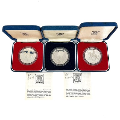 Lot 61 - Three cased commemorative Royal mint silver proof coins.
