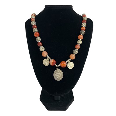 Lot 116 - A Bedouin carnelian and silver filligree bead necklace.