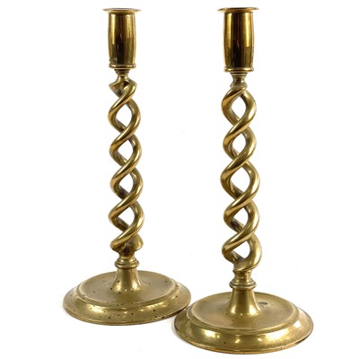 Lot 187 - A pair of Victorian brass barley twist candlesticks.